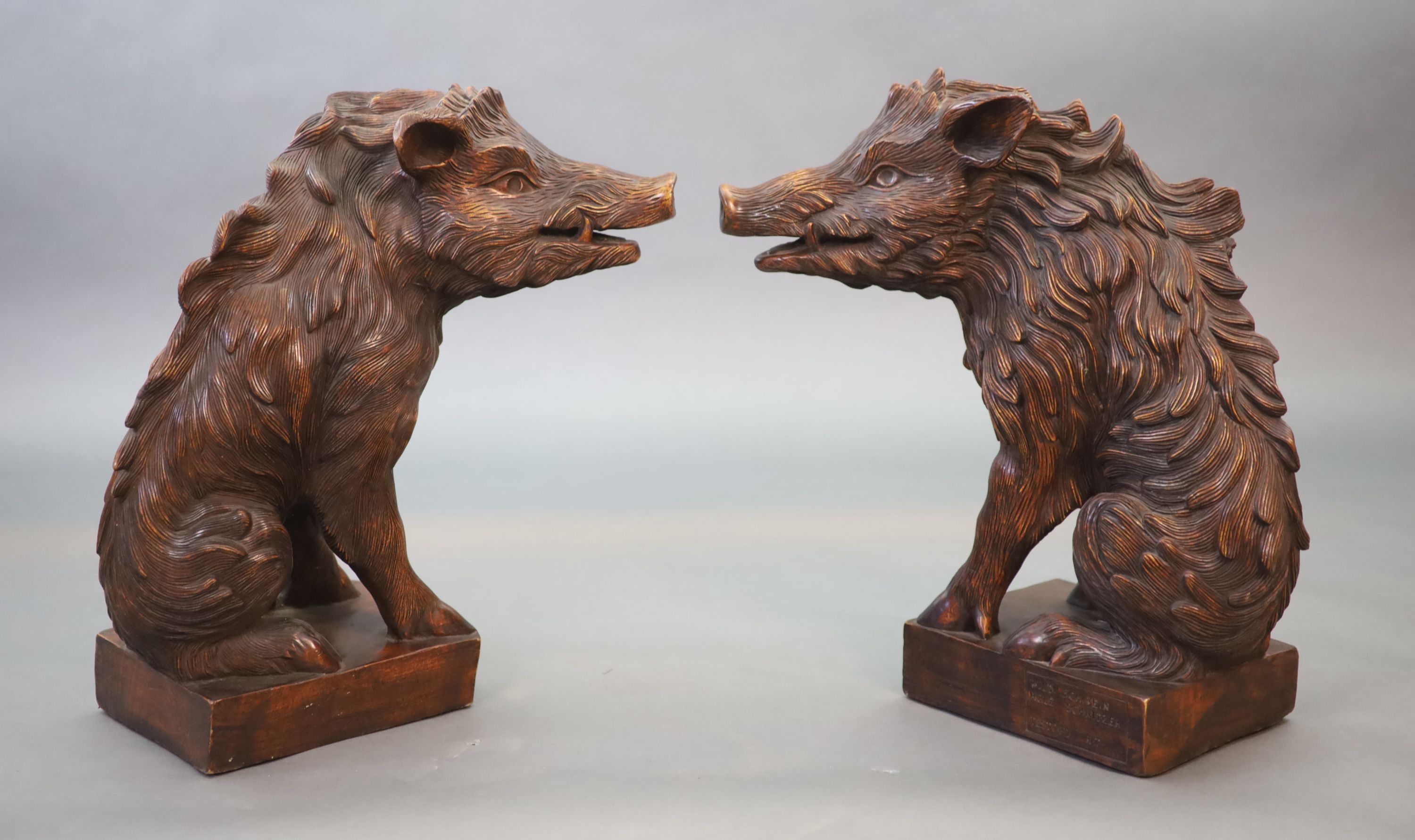 After Pietro Tacca (1577-1640), a pair of early 20th century walnut carvings 42cm wide, 55cm high (maximum)